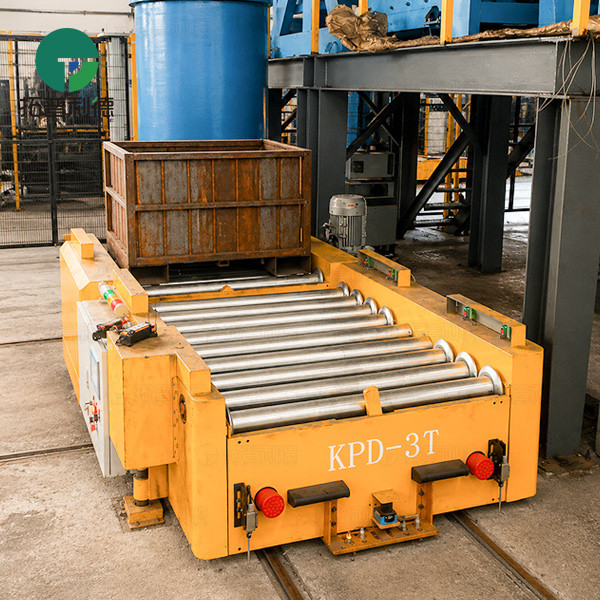 Rail Guided Vehicle with Roller Table for Automated Bin Transfer