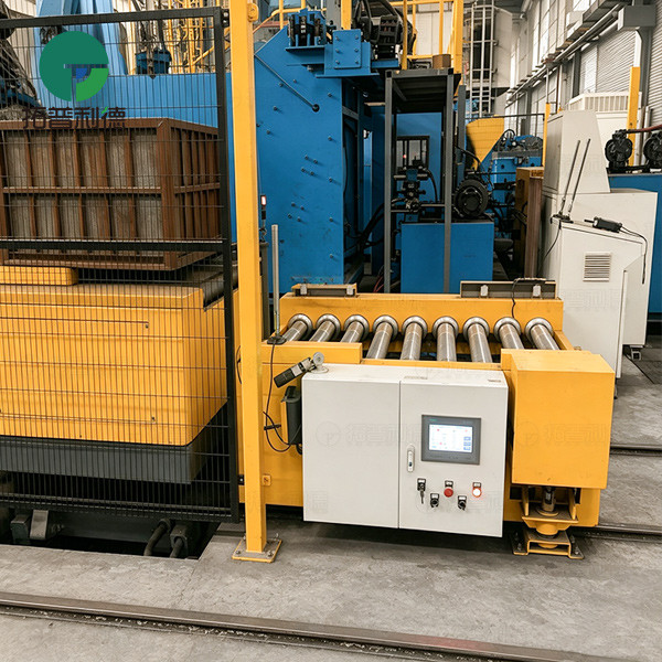 Rail Guided Vehicle with Roller Table for Automated Bin Transfer