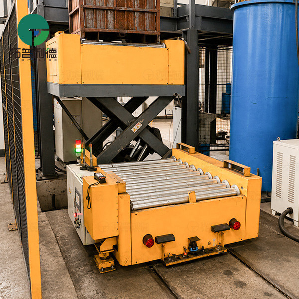 Rail Guided Vehicle with Roller Table for Automated Bin Transfer